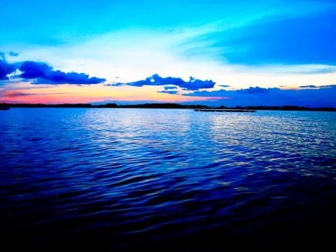 Twilight sunset in the sea Stock Photos