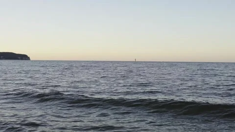 Twilight Tides: The Magic of Sunset by the Sea Stock Footage 293600904