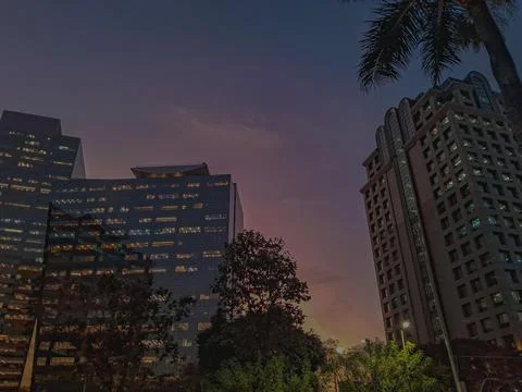 Twilight view between buildings. Stock Photos