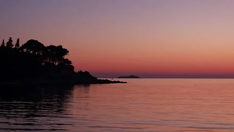 Twilight view of lighthouse light, Lapad Beach, Dubrovnik, Croatia, 4k Video stock 276366273