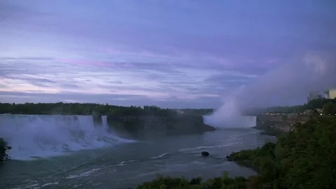 Twilight view of Niagara Falls with soft blue and purple hues in the sky Stock Footage 290794326