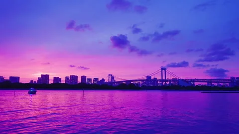 Twilight view of Rainbow Bridge and Tokyo Bay skyline at Odaiba Stock Footage 341620301