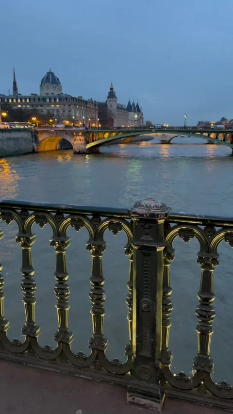 Twilight view of the Seine river and bridge in Paris, France. Stock Footage 340429336