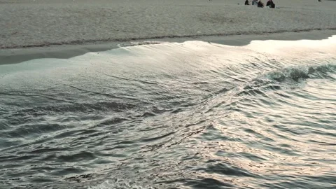 Twilight Waves: The Magic of Sunset by the Sea Stock Footage 293481179