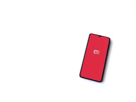 Twilio Authy Authenticator app launch screen on smartphone on white backgroun Stock Photos