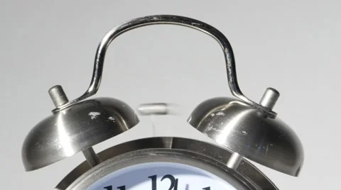 Twin Bell Silver Alarm Clock Ringing Loud Isolated on White Close Up, 4K Stock Footage 54472677