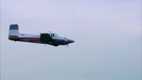 Twin Bonanza Fly By Stock Footage 74522889