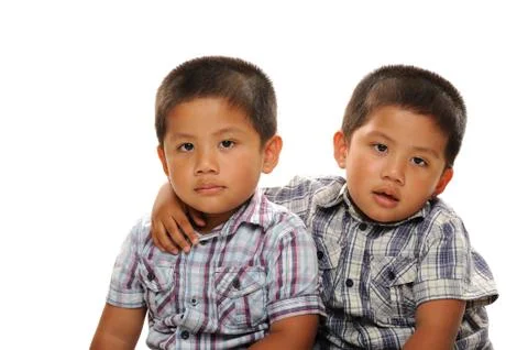 Twin boys cuddle Stock Photos