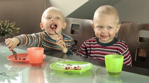 Twin boys with dirty faces posing for picture Video stock 11829719