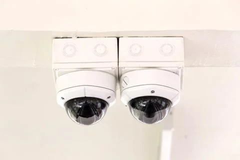 Twin CCTV security camera on ceiling. Stock Photos