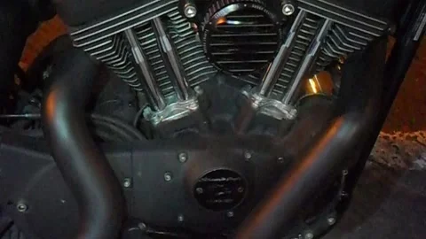Twin-cylinder engine of a motorcycle Stock Footage 133257854