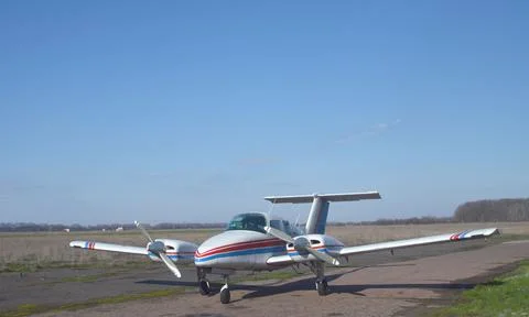Twin-engine aircraft with propellers Stock Photos