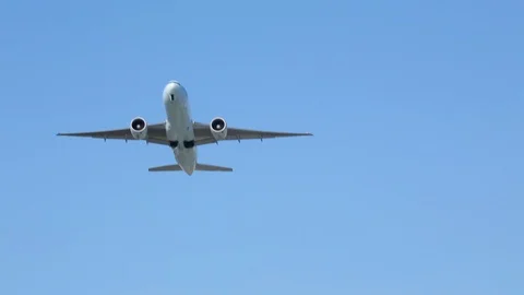 Twin engine jet plane airplane aircraft at takeoff flying in blue sky HD Stock Footage 104018824