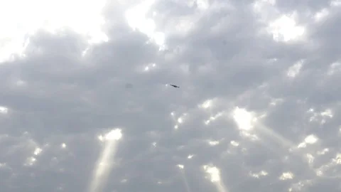 Twin-engine plane against a background of clouds Stock Footage 88950135