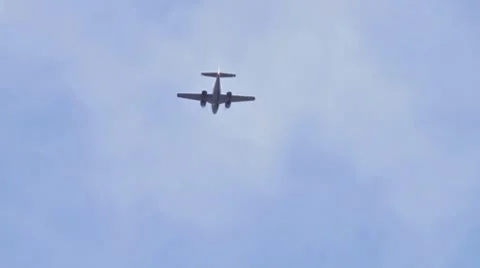 Twin Engine Plane Flies Over Through Clouds Stock Footage 8919142