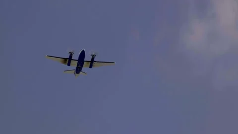 TWIN ENGINE TURBO PROP PLANE JUST AFTER DEPARTURE.  60 FPS Stock Footage 189502995