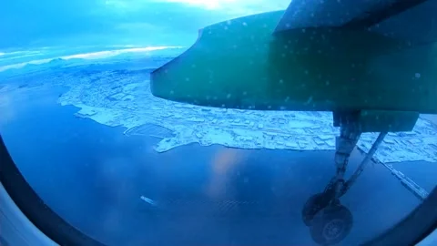 Twin Prop Approach Over Leknes- Bodo, Lofoten Norway in winter. Stock Footage 333783105