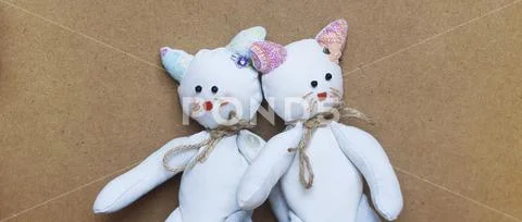 Twin toy cats Stock Photos