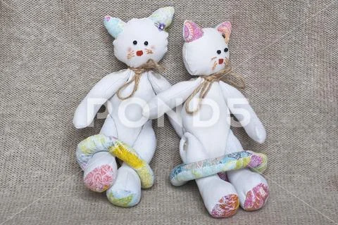 Twin toy cats Stock Photos