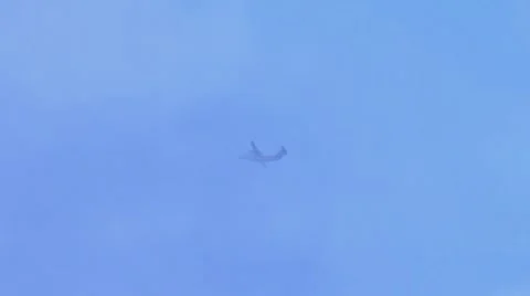 Twin Turboprop Ascends into Clouds Stock Footage 8555329