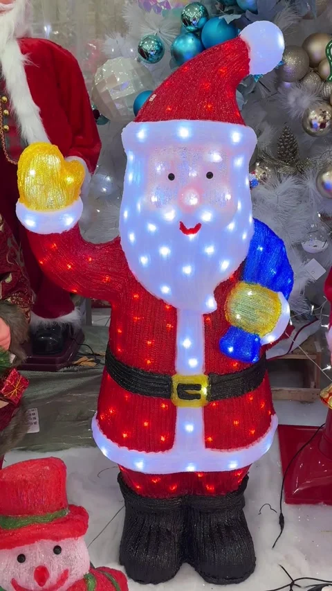 Twinkle sparkling interactive light inside Santa Claus doll christmas toy. Vídeos de archivo 294764400