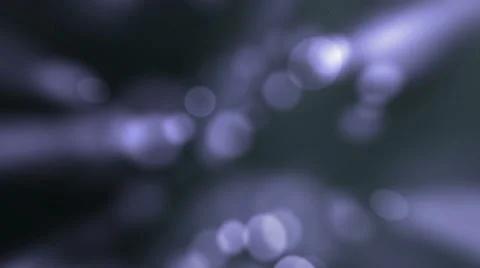 Twinkling defocused dust particles colorful abstract animation dark background Stock Footage