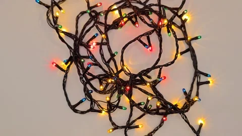 Twinkling multi-colored New Year's lights, top view Stock Footage 322539686