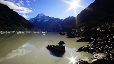 Twinkling Sun And Reflection, Hooker Glacier Lake, Mount Cook National Park  스톡 동영상 63681654