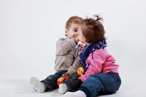 Twins with apples Stock Photos