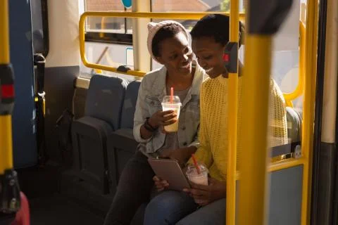 Twins siblings using digital tablet Foto stock