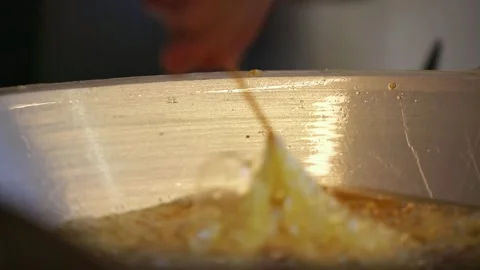 Twist the bamboo stick to make egg rolls Stock Footage 268515965