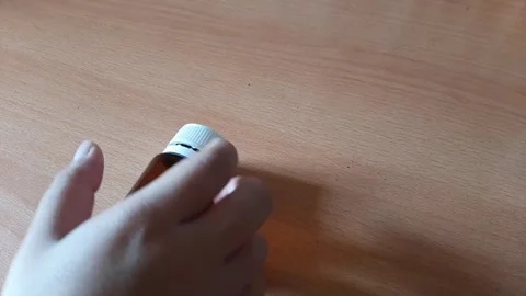 Twist top pill bottle, empty medicine bottle Stock Footage 292736801