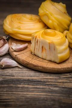 Twisted artisan cheese Stock Photos