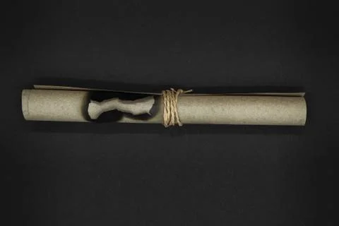 Twisted burned beige scroll paper Foto stock