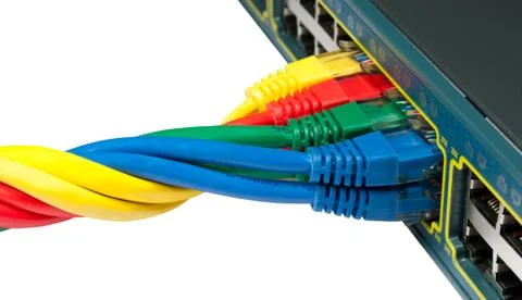 Twisted Ethernet Network Cables Connected to a Hub, Switch Stock Photos