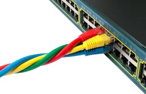 Twisted Ethernet Network Cables Connected to a Hub, Switch Stock Photos