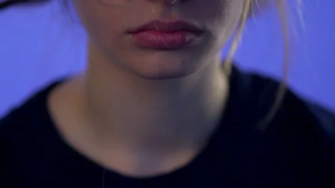 Twisted locks of hair fall on a woman's face. Stock Footage 77582921