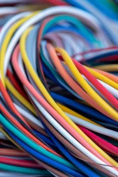 Twisted multicolored electric computer cable Stock-Fotos