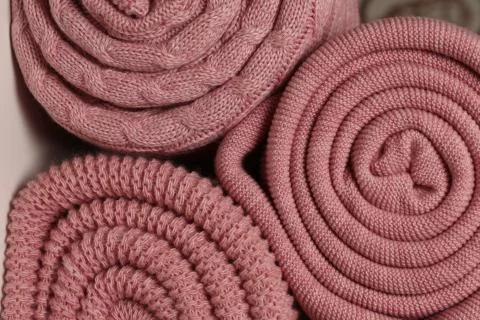 Twisted pink blankets. Close up Stock Photos
