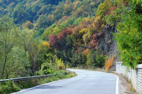 Twisted road in the mountains in the fall Stock Photos