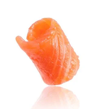Twisted slice of salmon close-up isolated on white Stock Photos
