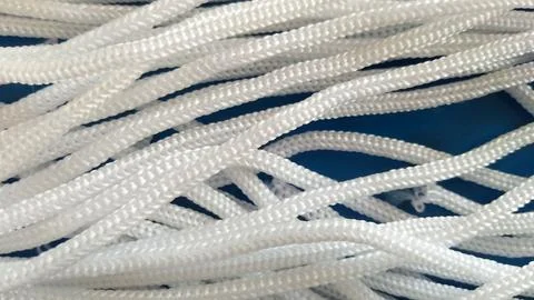 Twisted thick rope isolated on white background Stock Photos