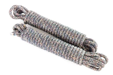 Twisted thick rope on white. 스톡 사진