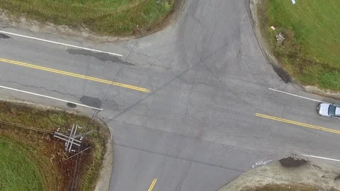 Twisting Bird's Eye View of a Rural Intersection Stock Footage