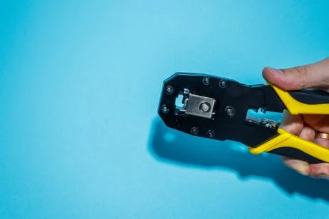 Twisting Cable Tool Twisted Pair Ethernet UTP Cat 5, Crimping RJ45 LAN cable, Stock Photos