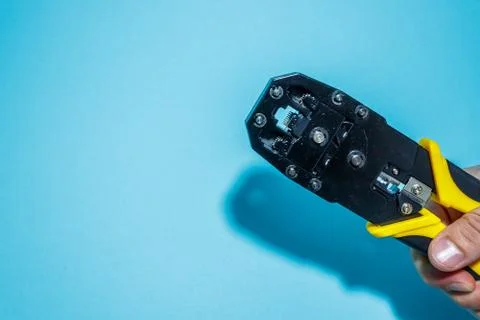 Twisting Cable Tool Twisted Pair Ethernet UTP Cat 5, Crimping RJ45 LAN cable, Stock Photos