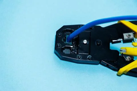 Twisting Cable Tool Twisted Pair Ethernet UTP Cat 5, Crimping RJ45 LAN cable, Stock Photos