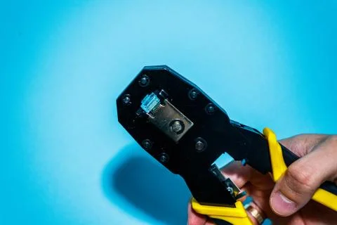 Twisting Cable Tool Twisted Pair Ethernet UTP Cat 5, Crimping RJ45 LAN cable, Stock Photos