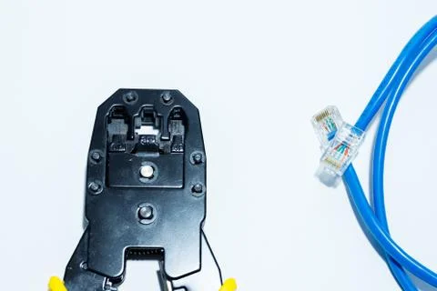 Twisting Cable Tool Twisted Pair Ethernet UTP Cat 5, Crimping RJ45 LAN cable, Stock Photos