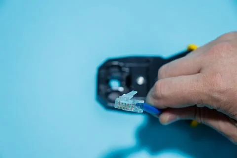 Twisting Cable Tool Twisted Pair Ethernet UTP Cat 5, Crimping RJ45 LAN cable, Stock Photos